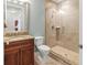 Bathroom showcasing a glass-enclosed shower and granite countertops, offering a modern and stylish design at 3420 77Th W St # 202, Bradenton, FL 34209