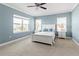 A serene bedroom with a large window and white furniture at 3420 77Th W St # 202, Bradenton, FL 34209