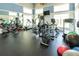 Well-equipped gym with treadmills, elliptical machines, weights, and mirrored walls for a complete fitness experience at 3420 77Th W St # 202, Bradenton, FL 34209