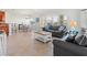 Bright and spacious living room with a view of the dining area and kitchen at 3420 77Th W St # 202, Bradenton, FL 34209