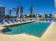 Inviting swimming pool with clear blue water and comfortable lounge chairs, perfect for relaxation and recreation at 3420 77Th W St # 202, Bradenton, FL 34209