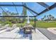An open-air patio including an outdoor dining set with a great view of the golf course at 3725 Spyglass Hill Rd, Sarasota, FL 34238
