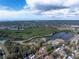 An aerial shot highlights a neighborhood with winding waterways, mangrove forests, and homes at 3811 30Th S Ave, St Petersburg, FL 33711