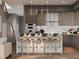 Contemporary kitchen featuring a large island with seating, modern appliances, and sleek cabinetry at 3811 30Th S Ave, St Petersburg, FL 33711
