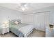Bright bedroom with ample closet space, neutral colors and a comfortable queen sized bed at 3917 Ashwood Ln # 57, Sarasota, FL 34232