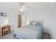 Serene bedroom with a desk, chair, and ample storage space with modern decor throughout the space at 3917 Ashwood Ln # 57, Sarasota, FL 34232