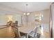 Open dining room adjacent to the living room and kitchen area in house at 3917 Ashwood Ln # 57, Sarasota, FL 34232