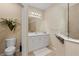 Well-lit bathroom featuring a vanity, mirror, and glass-enclosed shower at 4021 Wildgrass Pl, Parrish, FL 34219