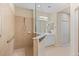 Beautifully designed bathroom with a large walk-in shower and vanity at 4021 Wildgrass Pl, Parrish, FL 34219