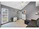 Comfortable bedroom with neutral tones, vaulted ceiling, and natural light at 4063 Woodview Dr, Sarasota, FL 34232