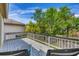 Outdoor deck space with lush greenery views at 4063 Woodview Dr, Sarasota, FL 34232
