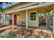 Cozy front porch with seating area, creating a welcoming entrance to the home at 4063 Woodview Dr, Sarasota, FL 34232