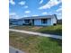 Well-kept single-story home with a neatly landscaped front yard at 4070 Grobe St, North Port, FL 34287