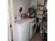 Functional laundry room with modern washer and dryer at 4070 Grobe St, North Port, FL 34287