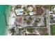 Birds eye view of waterfront property with lush surroundings and a beautiful view at 4214 Higel Ave, Sarasota, FL 34242