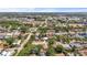 Overhead view of a quiet neighborhood featuring well-maintained homes and green landscaping at 4311 2Nd E Ave, Bradenton, FL 34208