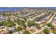 Expansive aerial view of a waterfront neighborhood, revealing beautiful homes with canal access and serene waterways at 4311 2Nd E Ave, Bradenton, FL 34208