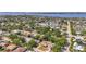 Panoramic aerial view of the neighborhood, showcasing lush greenery, water views and a serene residential setting at 4311 2Nd E Ave, Bradenton, FL 34208
