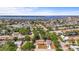 Aerial view of a neighborhood with a glimpse of the bay and bridge in the distance at 4311 2Nd E Ave, Bradenton, FL 34208