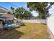 Spacious backyard with a deck and lush green lawn, perfect for outdoor activities and relaxation at 4311 2Nd E Ave, Bradenton, FL 34208