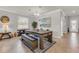 Dining room with a pool table and modern lighting at 4406 Baltry Ct, Bradenton, FL 34211