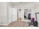 A spacious exercise room has workout equipment, mirrors, and a double door closet at 4406 Baltry Ct, Bradenton, FL 34211