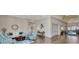 Inviting lobby featuring comfortable seating, stylish decor, and a view into a dining area at 4406 Baltry Ct, Bradenton, FL 34211