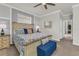 Spacious main bedroom features a bed with decorative pillows, neutral carpet, and light gray walls at 4406 Baltry Ct, Bradenton, FL 34211