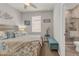 Relaxing main bedroom features a plush bed, neutral decor, and a glass enclosed shower at 4406 Baltry Ct, Bradenton, FL 34211