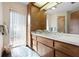 Bathroom boasts a vanity, bright natural light, and plenty of storage space at 4711 Ocean Blvd, Sarasota, FL 34242