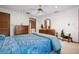 Comfortable bedroom with natural light and direct bathroom access at 4711 Ocean Blvd, Sarasota, FL 34242