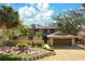 Charming two-story home with well-maintained landscaping, mature trees and two car garage at 4711 Ocean Blvd, Sarasota, FL 34242