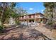 Spacious two-story home with a pool, balconies, and outdoor seating area at 4711 Ocean Blvd, Sarasota, FL 34242