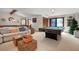 Open game room with pool table, comfortable seating, and stylish decor at 4711 Ocean Blvd, Sarasota, FL 34242