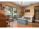 View of the living room and the sliding door to the patio at 4711 Ocean Blvd, Sarasota, FL 34242