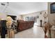 Open living room featuring a large sliding glass door with backyard pool view at 4711 Ocean Blvd, Sarasota, FL 34242