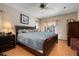 Spacious main bedroom featuring a large bed and view to the outside at 4711 Ocean Blvd, Sarasota, FL 34242