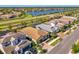 Aerial view showing the home's backyard with close proximity to neighborhood amenities and green spaces at 4889 Antrim Dr, Sarasota, FL 34240