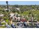 Aerial view of residential neighborhood with manicured lawns, mature landscaping and assigned parking at 510 Spring Lakes Blvd, Bradenton, FL 34210