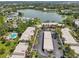 Apartment aerial view near a peaceful lake and lush green spaces at 510 Spring Lakes Blvd, Bradenton, FL 34210