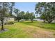 Spacious backyard with greenery, trees, and views at 510 Spring Lakes Blvd, Bradenton, FL 34210