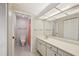 Bathroom with a vanity and a separate water closet with toilet and shower at 510 Spring Lakes Blvd, Bradenton, FL 34210