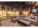 Outdoor gazebo featuring comfortable seating, lighting, and a view of the outdoor amenities at 5151 Jasmine Way, Palm Harbor, FL 34685