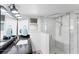 Bathroom with a modern vanity, sleek fixtures, and a glass-enclosed shower with marble tile at 5404 4Th Avenue Nw Dr, Bradenton, FL 34209