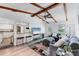 Open-concept living room featuring breakfast bar, modern decor, and comfortable seating at 5404 4Th Avenue Nw Dr, Bradenton, FL 34209