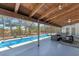 Spacious screened-in pool area with ample seating, offering a perfect blend of leisure and luxury at 5404 4Th Avenue Nw Dr, Bradenton, FL 34209