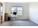 Bright office features carpet floors, bright window and storage shelves at 5688 Woodland Sage Dr, Sarasota, FL 34238
