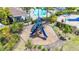 Overhead view of playground featuring slides, climbing structures, and seating area at 5688 Woodland Sage Dr, Sarasota, FL 34238