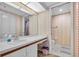 Well-maintained bathroom with a single sink vanity and a separate toilet and shower area at 6501 Stone River Rd # 209, Bradenton, FL 34203