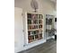 Library with fully stocked bookshelves and refreshment center promoting community and learning for residents at 6501 Stone River Rd # 209, Bradenton, FL 34203